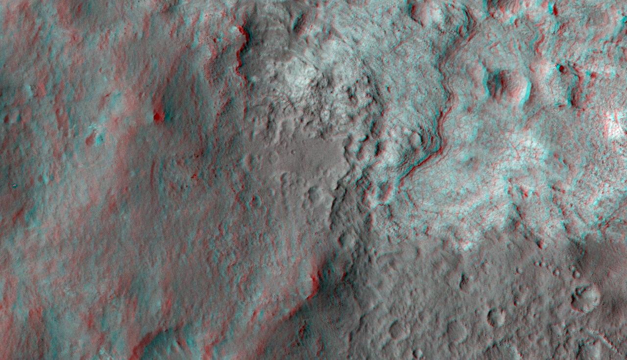 This 3-D image shows the upcoming science destination for NASA Mars rover Curiosity, a region dubbed Glenelg, where three different types of material seen from orbit come together.