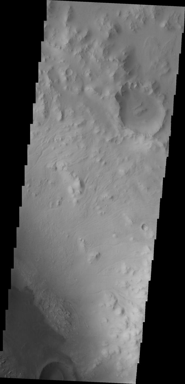 Moving further east, we see more dunes. This image captured by NASA 2001 Mars Odyssey spacecraft shows more of the crater rim and the crater floor seen in the image is not as smooth as in other parts of the crater.