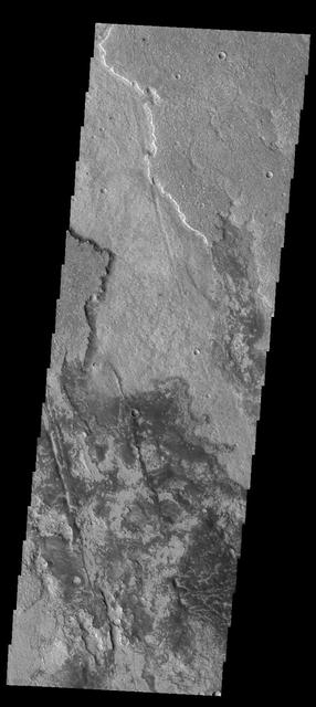 This image captured by NASA 2001 Mars Odyssey spacecraft shows a small portion of the lava flows of Solis Planum.