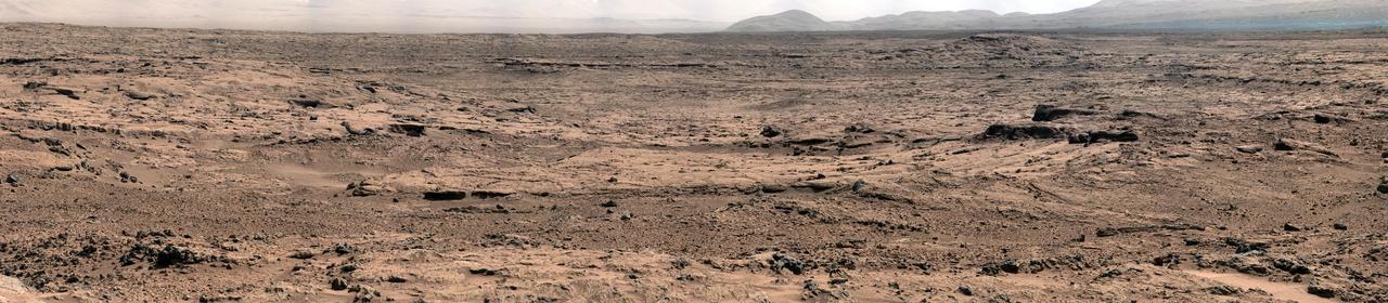 The image, which has been white-balanced to show what the rocks and soils in it would look like if they were on Earth, is a mosaic of images taken at a site called Rocknest while NASA Mars rover Curiosity was working.