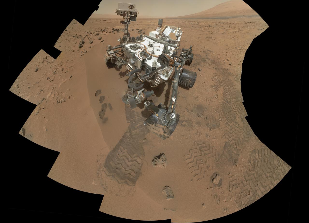 This mosaic from NASA Mars rover, Curiosity, shows the first four of five places from which the rover scoop obtained sand to clean the sample handling and processing system.