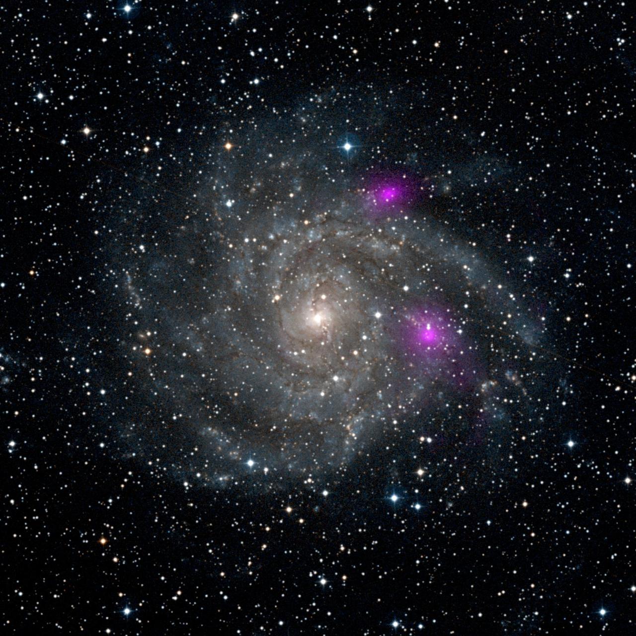 This new view of spiral galaxy IC 342, also known as Caldwell 5, includes data from NASA Nuclear Spectroscopic Telescope Array, or NuSTAR. IC 342 lies 7 million light-years away in the Camelopardalis constellation.