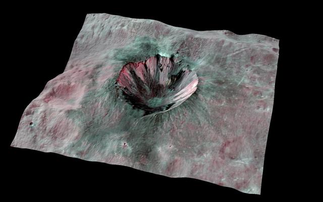 This composite-color view from NASA Dawn mission shows Cornelia Crater, streaked with dark materials, on the giant asteroid Vesta. You need 3D glasses to view this image.