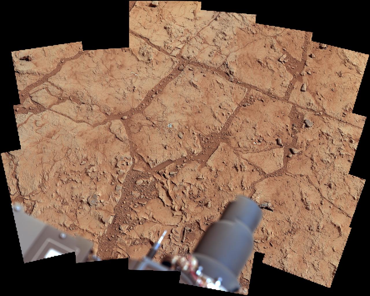 NASA Mars rover Curiosity used its Mast Camera Mastcam to take the images combined into this mosaic of the drill area, called John Klein, where the rover ultimately performed its first sample drilling.