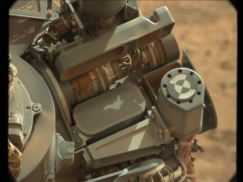 This image shows the location of the 150-micrometer sieve screen on NASA Mars rover Curiosity, a device used to remove larger particles from samples before delivery to science instruments.