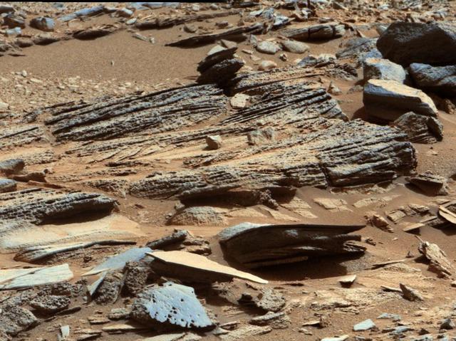 This image from the Mast Camera Mastcam on NASA Mars rover Curiosity shows inclined layering known as cross-bedding in an outcrop called Shaler.