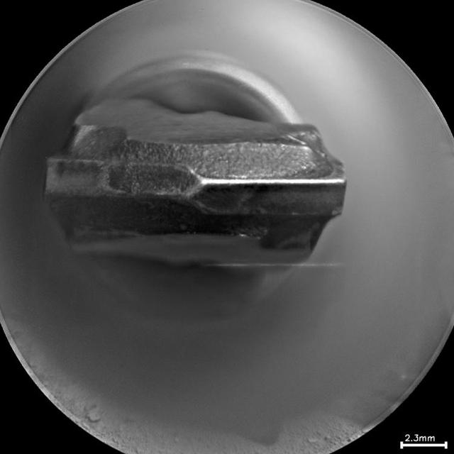 This head-on view shows the tip of the drill bit on NASA Mars rover Curiosity. The view merges two exposures taken by the remote micro-imager in the rover ChemCam instrument at different focus settings.