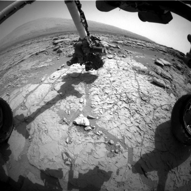 This frame from a set of three images from NASA Curiosity rover shows the rover drill in action on Feb. 8, 2013, or Sol 182, Curiosity 182nd Martian day of operations.
