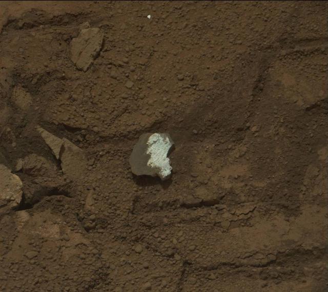 This raw image of Tintina, a broken rock fragment in a rover wheel track, was taken by Curiosity Mast Camera Mastcam.