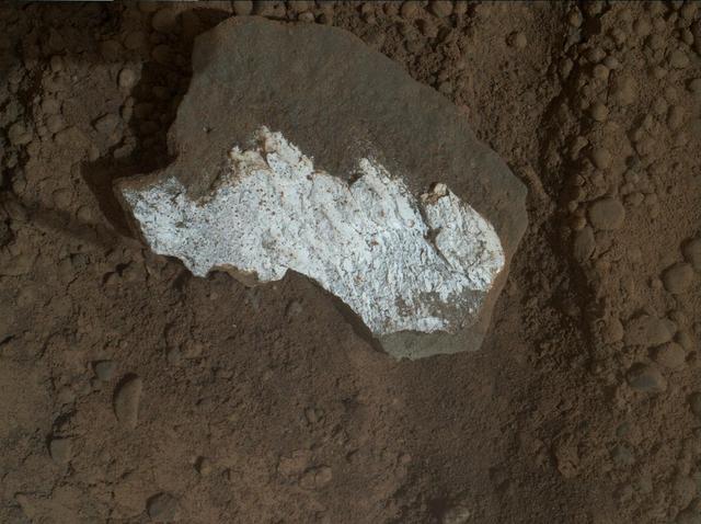 NASA rover Curiosity took this close-up view of Tintina showing interesting linear textures in the bright white material on the rock.