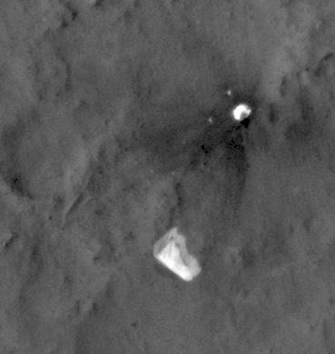 This image from NASA Mars Reconnaissance Orbiter shows wind-caused changes in the parachute of NASA Mars Science Laboratory spacecraft as the chute lay on the Martian ground during months after its use in safe landing of the Curiosity rover.