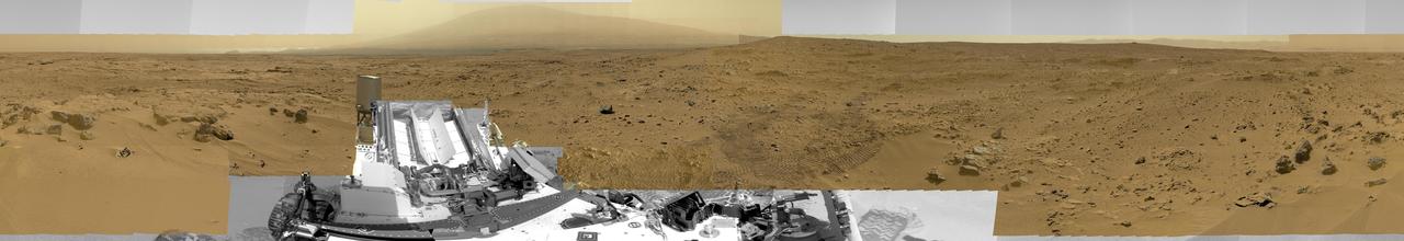 This image from NASA Curiosity Mars rover shows Curiosity at the Rocknest site where the rover scooped up samples of windblown dust and sand.