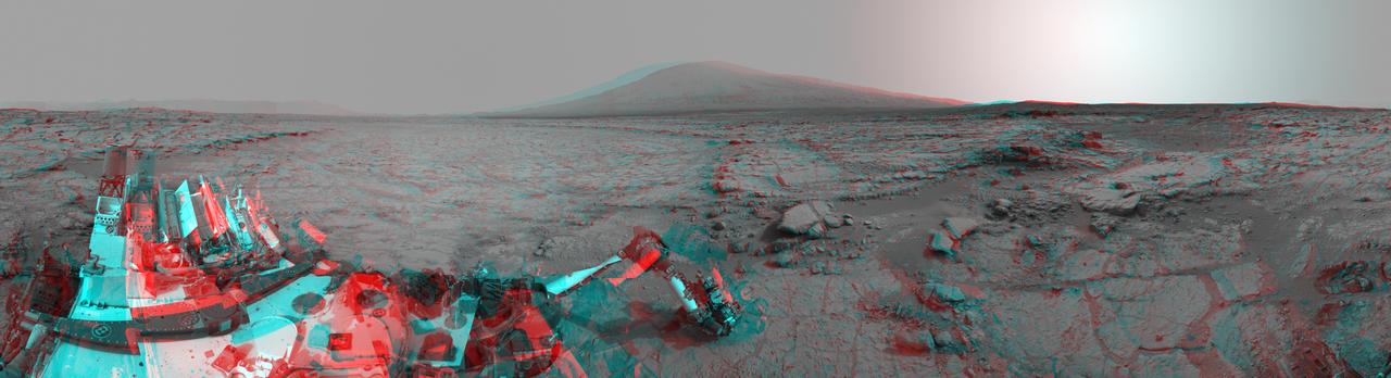 The left and right eyes of the Navigation Camera Navcam in NASA Curiosity Mars rover took the dozens of images combined into this 3-D scene of the rover and its surroundings.