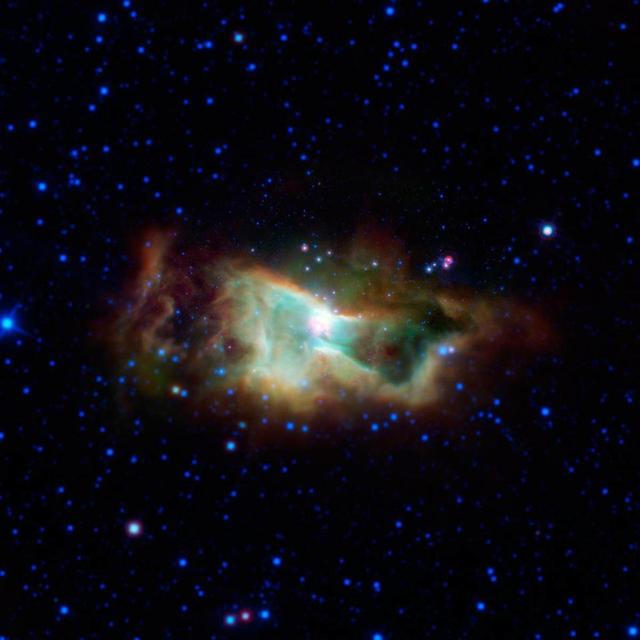 This cloud of glowing gas is the Iris nebula, also called NGC 7023.as seen in infrared light by NASA Spitzer Space Telescope. It lies 1,300 light-years away in the Cepheus constellation.
