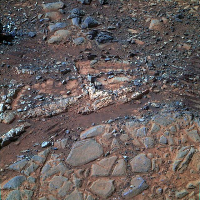 This image from the panoramic camera Pancam on NASA Mars Exploration Rover Opportunity shows a pale rock called Esperence, which was inspected by the rover in May 2013.
