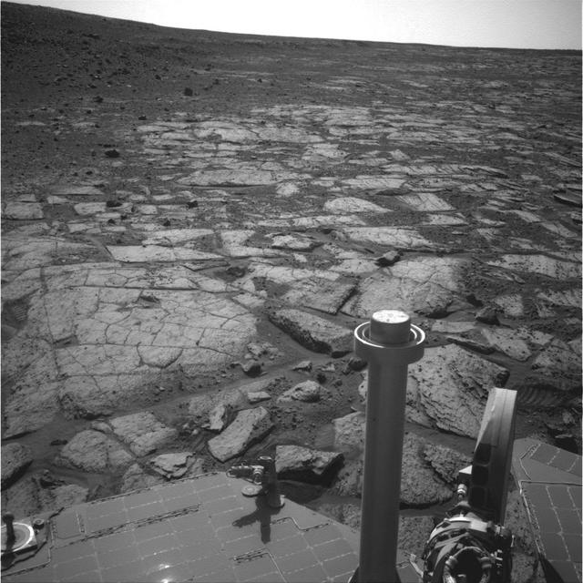 NASA Mars Exploration Rover Opportunity used its navigation camera Navcam to record this image of the northern end of Solander Point, a raised section of the western rim of Endeavour Crater.