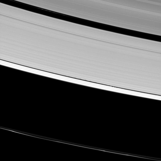 Saturn A ring is decorated with several kinds of waves. NASA Cassini spacecraft has captured a host of density waves, a bending wave, and the edge waves on the edge of the Keeler gap caused by the small moon Daphnis.