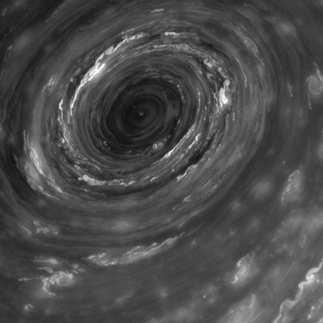 The vortex at Saturn north pole, seen here in the infrared by NASA Cassini spacecraft, takes on the menacing look.