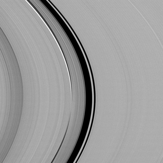 A dynamical interplay between Saturn largest moon, Titan, and its rings is captured in this view from NASA Cassini spacecraft.