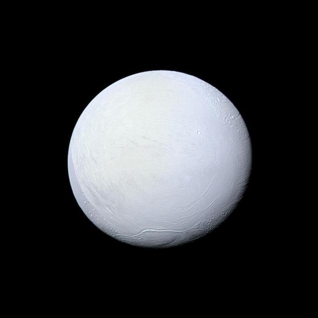 Saturn's moon Enceladus, covered in snow and ice, resembles a perfectly packed snowball in this image from NASA's Cassini mission. Cassini has imaged Enceladus many times throughout its mission, discovering a fractured surface and the now-famous geysers that erupt icy particles and water vapor from fractures crossing the moons' 200-mile-wide (300-kilometer-wide) south polar terrain.  The mountain ridge seen in the south in this image is part of the undulating mountain belt that circumscribes this region. This view looks toward the leading side of Enceladus (313 miles, 504 kilometers across). North on Enceladus is up and rotated 6 degrees to the left. The image was taken with the Cassini spacecraft narrow-angle camera on March 10, 2012, using filters sensitive to ultraviolet, visible and infrared light (spanning wavelengths from 338 to 750 nanometers).  The view was acquired at a distance of approximately 106,000 miles (170,000 kilometers) from Enceladus. Image scale is 3,336 feet (1 kilometer) per pixel.  http://photojournal.jpl.nasa.gov/catalog/PIA17182