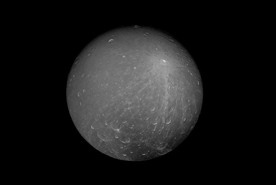 Cassini captured this striking view of Saturn's moon Dione on July 23, 2012. Dione is about 698 miles (1,123 kilometers) across. Its density suggests that about a third of the moon is made up of a dense core (probably silicate rock) with the remainder of its material being water ice. At Dione's average temperature of -304 degrees Fahrenheit (-186 degrees Celsius), ice is so hard it behaves like rock.  The image was taken with Cassini's narrow-angle camera at a distance of approximately 260,000 miles (418,000 kilometers) from Dione, through a polarized filter and a spectral filter sensitive to green light.  The Cassini spacecraft ended its mission on Sept. 15, 2017.  https://photojournal.jpl.nasa.gov/catalog/PIA17197
