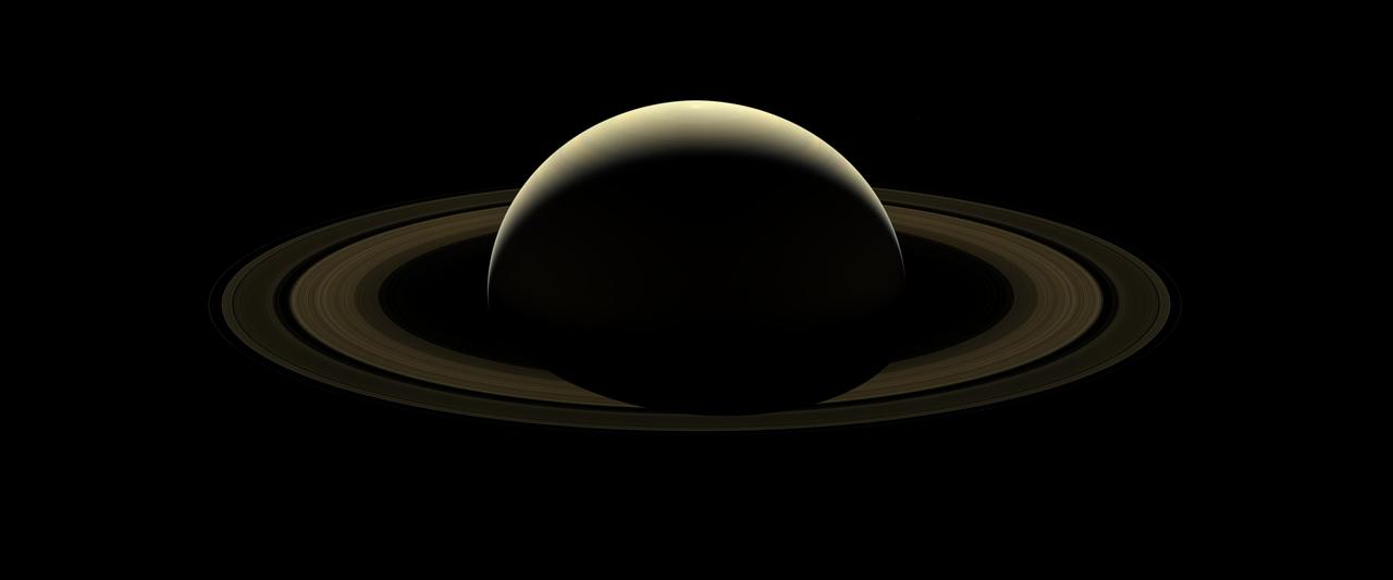 After more than 13 years at Saturn, and with its fate sealed, NASA's Cassini spacecraft bid farewell to the Saturnian system by firing the shutters of its wide-angle camera and capturing this last, full mosaic of Saturn and its rings two days before the spacecraft's dramatic plunge into the planet's atmosphere. During the observation, a total of 80 wide-angle images were acquired in just over two hours. This view is constructed from 42 of those wide-angle shots, taken using the red, green and blue spectral filters, combined and mosaicked together to create a natural-color view. Six of Saturn's moons -- Enceladus, Epimetheus, Janus, Mimas, Pandora and Prometheus -- make a faint appearance in this image. (Numerous stars are also visible in the background.) A second version of the mosaic is provided in which the planet and its rings have been brightened, with the fainter regions brightened by a greater amount. (The moons and stars have also been brightened by a factor of 15 in this version.) The ice-covered moon Enceladus -- home to a global subsurface ocean that erupts into space -- can be seen at the 1 o'clock position. Directly below Enceladus, just outside the F ring (the thin, farthest ring from the planet seen in this image) lies the small moon Epimetheus. Following the F ring clock-wise from Epimetheus, the next moon seen is Janus. At about the 4:30 position and outward from the F ring is Mimas. Inward of Mimas and still at about the 4:30 position is the F-ring-disrupting moon, Pandora. Moving around to the 10 o'clock position, just inside of the F ring, is the moon Prometheus. This view looks toward the sunlit side of the rings from about 15 degrees above the ring plane. Cassini was approximately 698,000 miles (1.1 million kilometers) from Saturn, on its final approach to the planet, when the images in this mosaic were taken. Image scale on Saturn is about 42 miles (67 kilometers) per pixel. The image scale on the moons varies from 37 to 50 miles (59 to 80 kilometers) pixel. The phase angle (the Sun-planet-spacecraft angle) is 138 degrees. The Cassini spacecraft ended its mission on Sept. 15, 2017. https://photojournal.jpl.nasa.gov/catalog/PIA17218