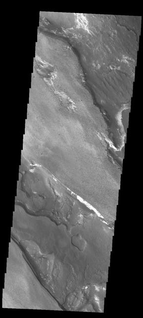 The different layers of material in this occur in Aram Chaos as seen in this image from NASA 2001 Mars Odyssey spacecraft.