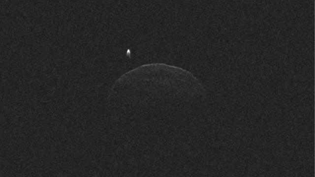 This radar imagery of asteroid 1998 QE2 and its moon was generated from data collected by NASA 230-foot-wide 70-meter Deep Space Network antenna at Goldstone, Calif., on June 1, 2013.