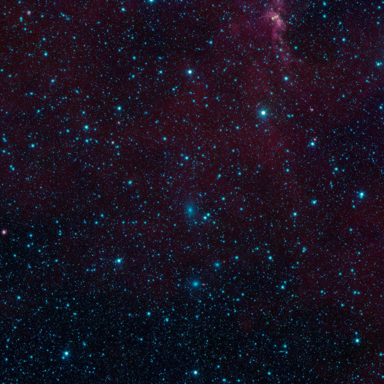 There are nearly 200 galaxies within the marked circles in this image from NASA Spitzer Space Telescope. These are part of the Perseus-Pisces supercluster of galaxies located 250 million light-years away.