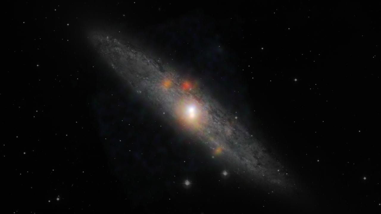 The Sculptor galaxy is seen in a new light, in this composite image from NASA Nuclear Spectroscopic Telescope Array NuSTAR and the European Southern Observatory in Chile.