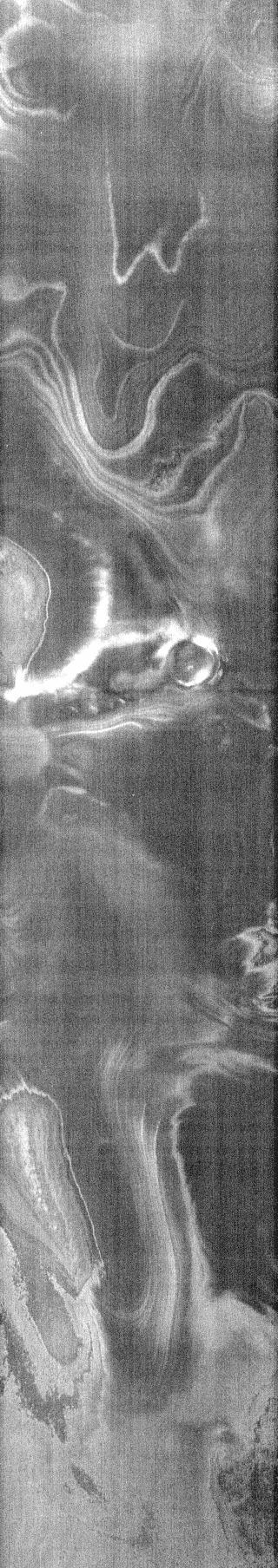 Do you see what I see in this image from NASA Mars Odyssey spacecraft? The eyes and nose of a giant man glares from the top of this nighttime infrared image.