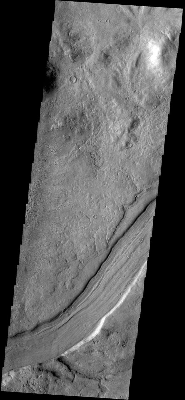 This image captured by NASA 2001 Mars Odyssey spacecraft shows a small section of Reull Vallis.