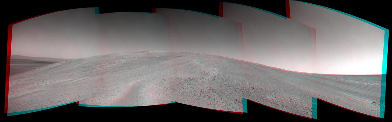 NASA Mars Exploration Rover Opportunity captured this 3-D view after beginning to ascend the northwestern slope of Solander Point on the western rim of Endeavour Crater.