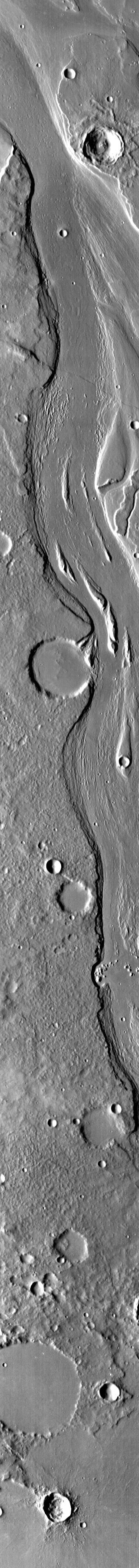 This IR image from NASA 2001 Mars Odyssey spacecraft shows streamlined islands in the channel of Mangala Valles.