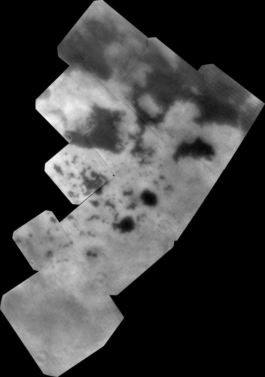 The vast hydrocarbon seas and lakes dark shapes near the north pole of Saturn moon Titan sprawl out beneath the watchful eye of NASA Cassini spacecraft. Scientists are studying images like these for clues about how Titan hydrocarbon lakes formed.