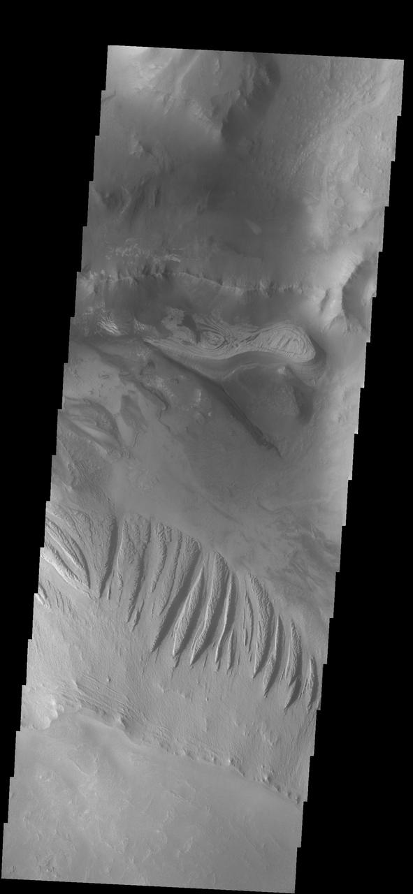 This image shows a portion of Candor Chasma as seen by NASA 2001 Mars Odyssey spacecraft.