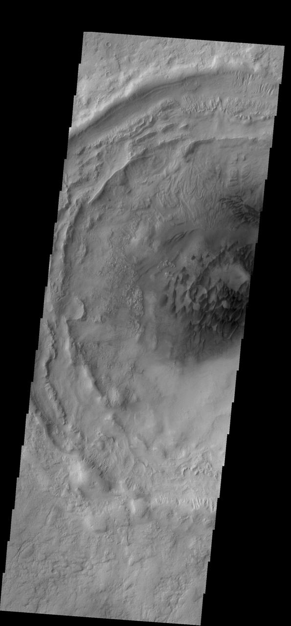 This image captured by NASA 2001 Mars Odyssey spacecraft shows the dunes on the floor of Bogia Crater, a crater in Hellas Planitia.