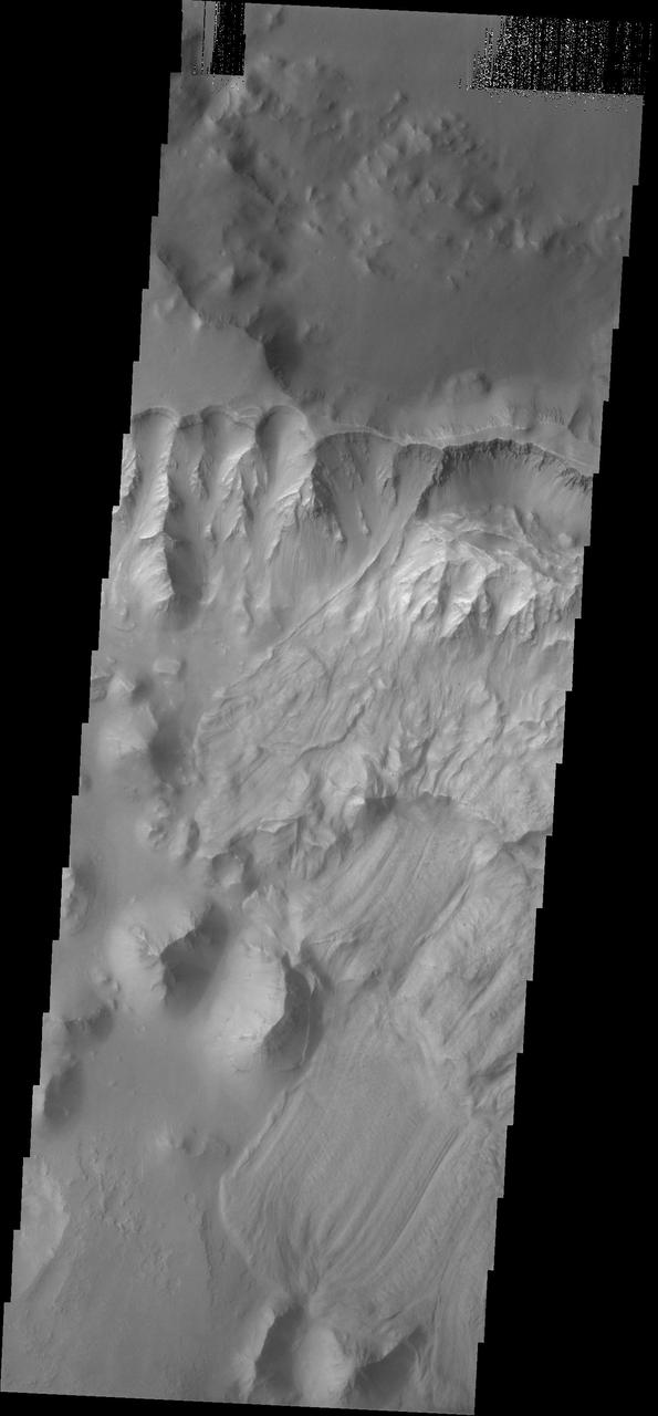 Several landslides occurred on this steep cliff face in this image captured by NASA 2001 Mars Odyssey spacecraft.