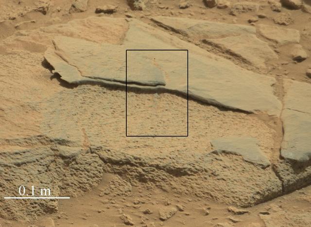 The rock Ithaca is shown here with a rougher lower texture and smoother texture on top, and appears to be a piece of the local sedimentary bedrock protruding from the surrounding soil in Gale Crater as seen by NASA Curiosity Mars rover.