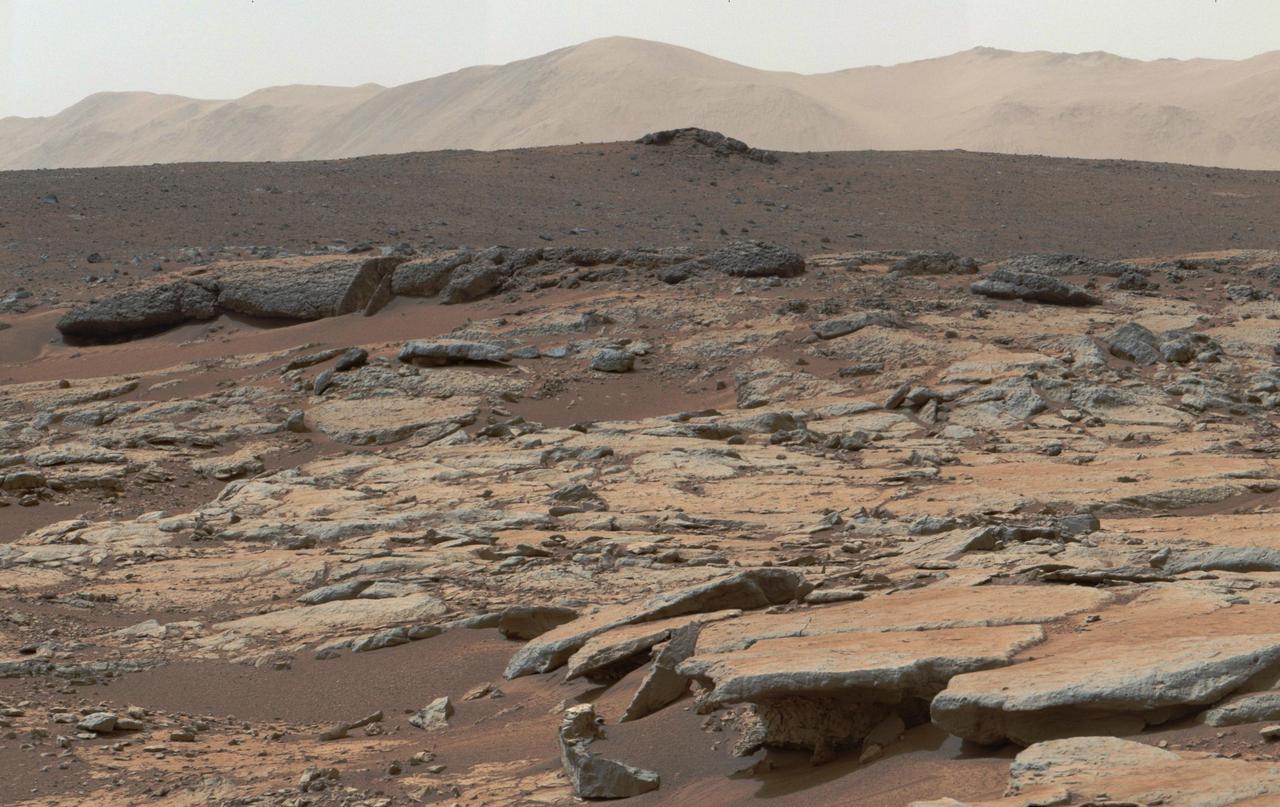 This mosaic of images from the Mast Camera onboard NASA Curiosity Mars rover shows a series of sedimentary deposits in the Glenelg area of Gale Crater, from a perspective in Yellowknife Bay looking toward west-northwest.