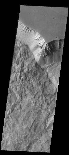 This image of Ophir Chasma shows part of a large landslide deposit as seen by NASA 2001 Mars Odyssey spacecraft.