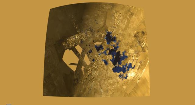 This frame from a colorized flyover movie from NASA Cassini mission shows the two largest seas on Saturn moon Titan and nearby lakes. The liquid in Titan lakes and seas is mostly methane and ethane.