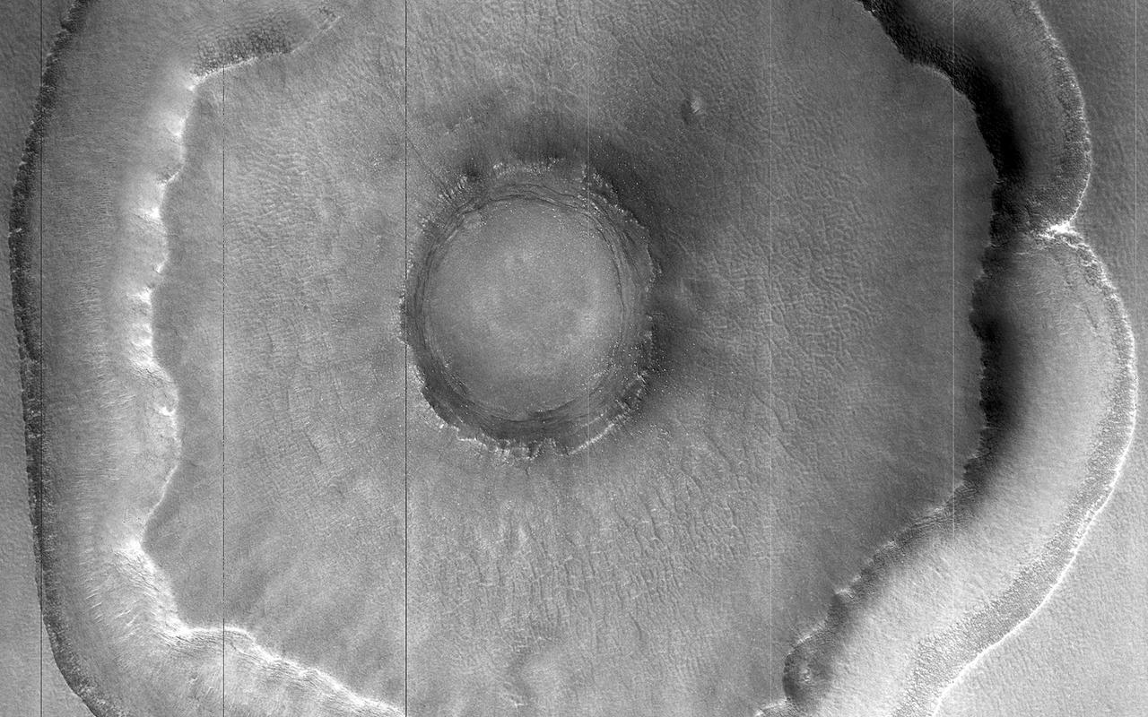 Does this observation from NASA Mars Reconnaissance Orbiter show a possible proto-pedestal crater? This crater has a ring trough, but the inner circle around the crater does not appear significantly elevated.