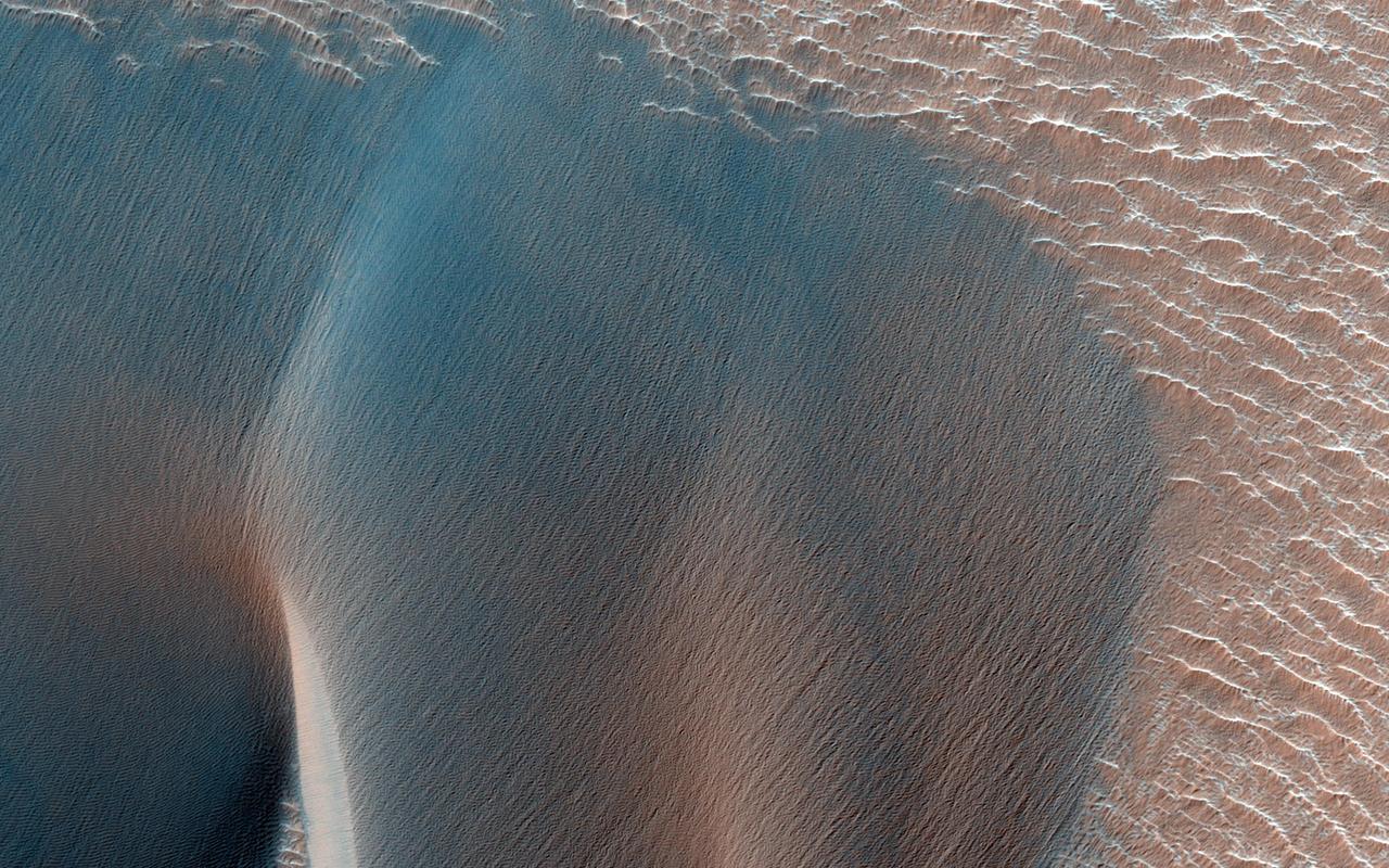 Landslides in Valles Marineris are truly enormous, sometimes stretching from one wall to the base of another. This landslide, known as Ius Labes, would occupy the surface area of the state of Delaware, U.S., seen by NASA Mars Reconnaissance Orbiter.