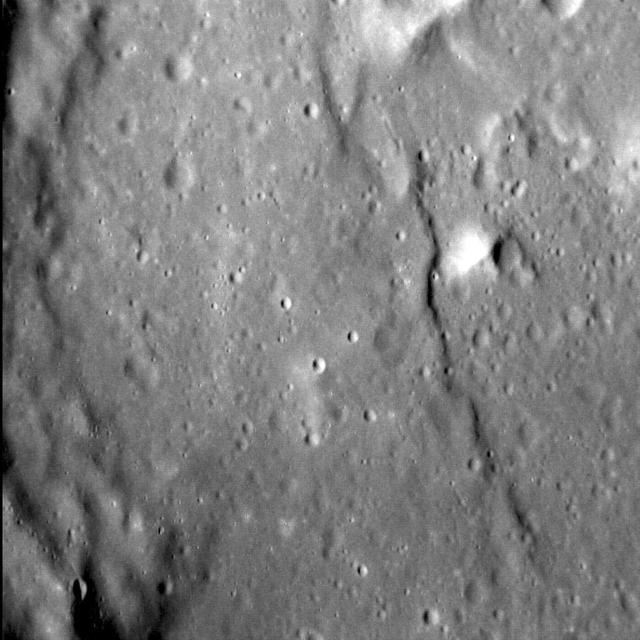 This observation from NASA Mars Reconnaissance Orbiter shows the central hills in Hale Crater with thousands of seasonal flows on steep slopes below bedrock outcrops.