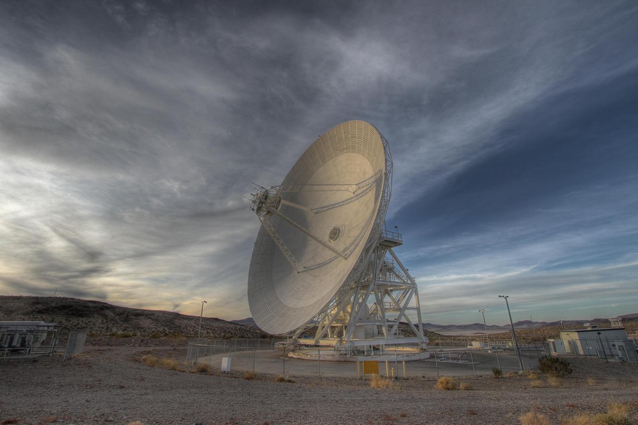 Goldstone 111.5-foot 34-meter Beam Waveguide tracks a spacecraft as it comes into view. The Goldstone Deep Space Communications Complex is located in the Mojave Desert in California, USA.