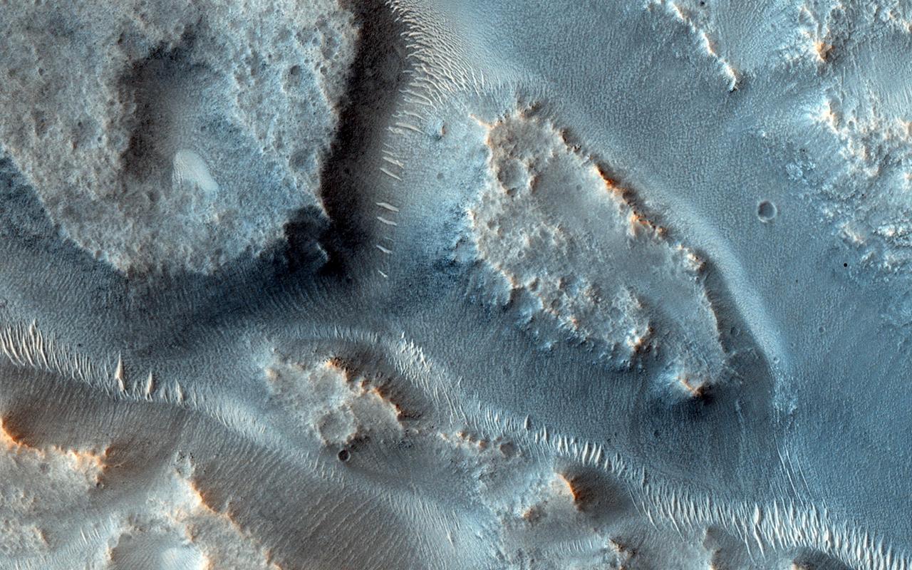 Many valleys occur all over Mars that reveal an extensive ancient history of liquid water erosion. This image from NASA Mars Reconnaissance Orbiter shows a complex valley network near Idaeus Fossae.