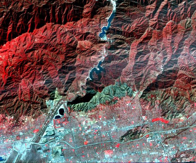 On Jan. 16, 2014, NASA Terra spacecraft acquired this image of a wildfire broke that out in the mountains above the Los Angeles suburbs of Glendora and Azusa.