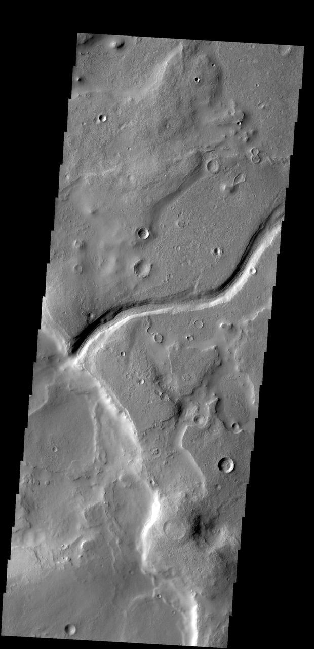 This image from NASA 2001 Mars Odyssey spacecraft shows a small unnamed channel on the eastern margin of Arabia Terra.