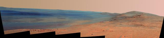 This false-color vista of the Endeavour Crater rim was acquired by NASA Mars Exploration Rover Opportunity panoramic camera on April 18, 2014, from Murray Ridge on the western rim of the crater.